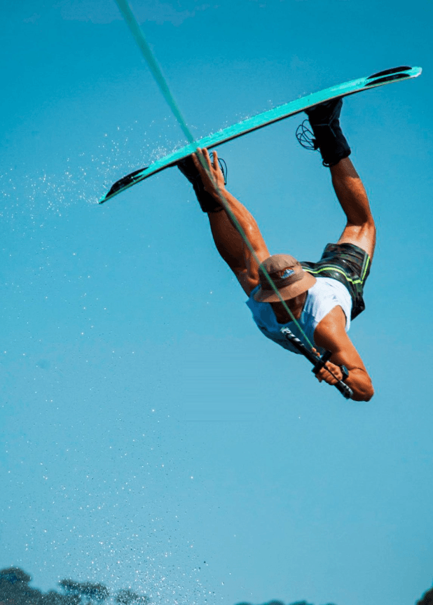 Martín Druille inverted mid-air above the water